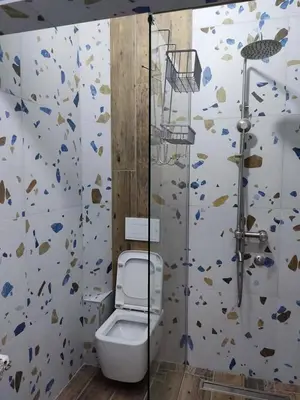 a bathroom with a shower and a toilet in it at Apartman Novak Luxury in Aleksandrovac