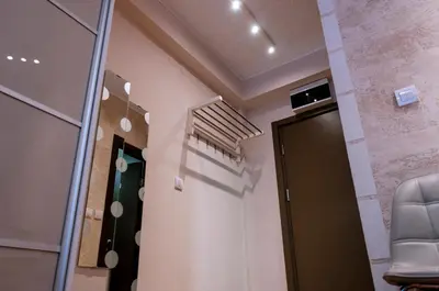 a room with a hallway with a door and a window at Lux Studio Kraljevi Čardaci in Kopaonik
