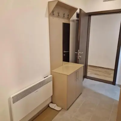 a room with a air conditioner and a closet with a door at Milmari Resort Spa and Wellness, Nlux 52a in Kopaonik
