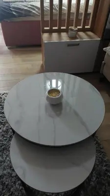 a white coffee table with a bowl of food on it at Apartman Mećavnik Kopaonik in Kopaonik