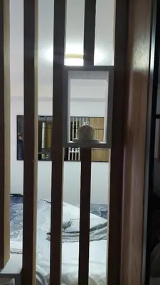 a view of a room through a glass door at Apartman Mećavnik Kopaonik in Kopaonik