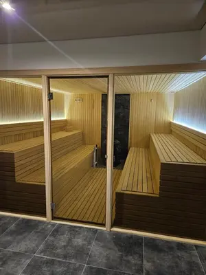 a sauna with wooden saucers in a building at Kopaonik, Apartman FORELIA, Residence hill in Kopaonik