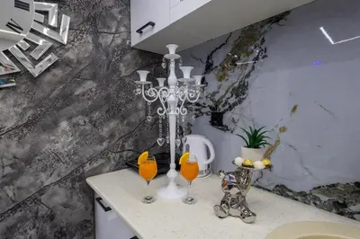 a bathroom with a counter with two glasses on it at Matija Lux in Kraljevo