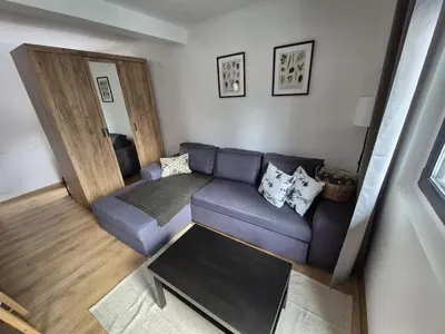 an overhead view of a living room with a blue couch at Mountain Nook in Kopaonik