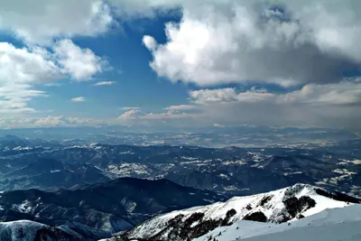 a view of a mountain range with snow covered mountains at Deluxe Mountain View Studio ViS in Residence Hill Hotel Kopaonik in Kopaonik