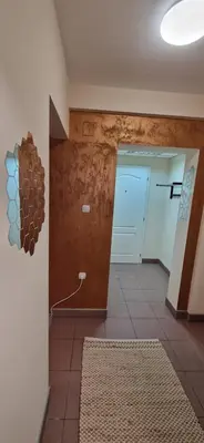 a room with a hallway with a room with a wall with at Plavi Dom in Ćuprija