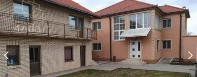 a house with a solar panel on the front of it at AK House in Niš
