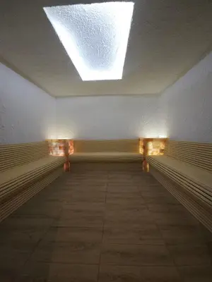 an empty hallway with a skylight in a building at Tontic Lux Residence Hill 54 in Kopaonik