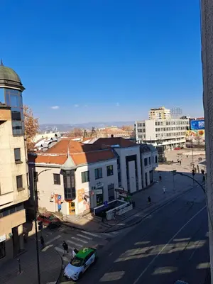 an overhead view of a city street with a car at Apartman Tea in Niš