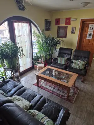 a living room with a couch and a coffee table at Vila Vienna in Zaječar
