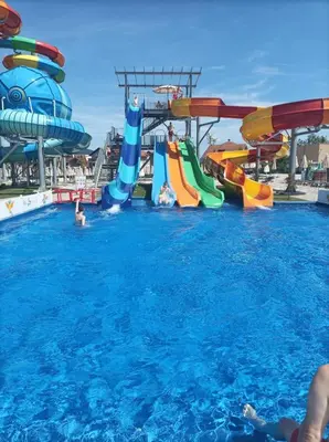 a group of slides in the water at a water park at Apartman Babić Lux in Vrnjačka Banja