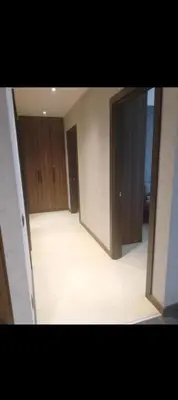an empty room with wooden cabinets and a empty floor at WOODside 70m2 Kopaonik in Kopaonik