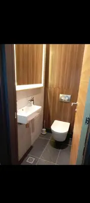 a bathroom with a sink and a toilet at WOODside 70m2 Kopaonik in Kopaonik