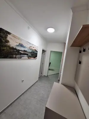 an empty room with a painting on the wall at Apartman Nikola Vukosavljevic in Kruševac