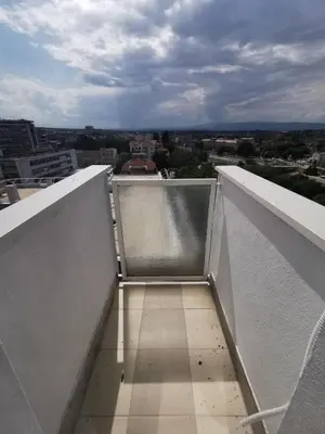 a view of a balcony on a building at Lunjica in Niš