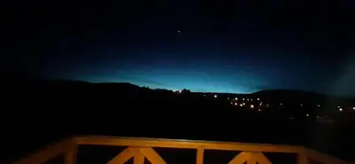 a night view of a city with lights at Goč Sunčani breg in Stanišinci