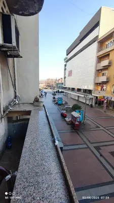 a view of a street with a building at Top rooms in Niš