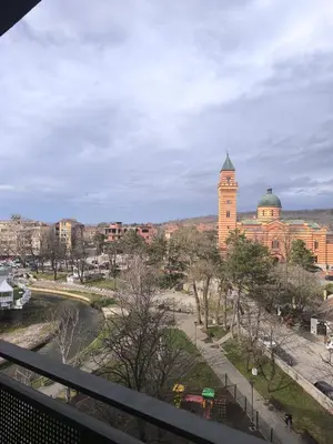 a view of a city with a clock tower at Mina Lux in Paraćin