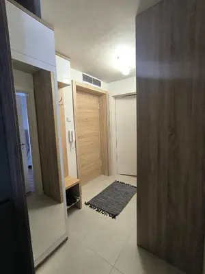 a hallway with a door leading to a room at Mina Lux in Paraćin