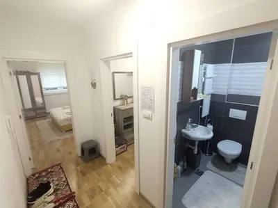 a bathroom with a toilet and a sink at Apartman ZVONKO in Vrnjačka Banja