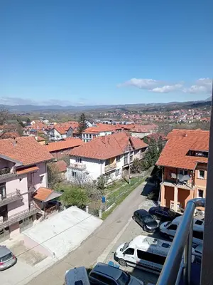 a view of a city with cars parked on a street at Moj kutak Sokobanja in Soko Banja