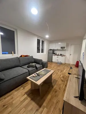a living room with a couch and a coffee table at New Resort Treska, Kopaonik in Kopaonik