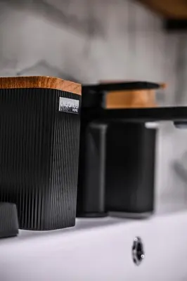 a wooden chair sitting on top of a counter at Apartmani EMA SL in Vranje