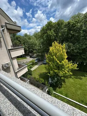 a view of a yard from the balcony of a house at EDEM Apartment in Vrnjačka Banja