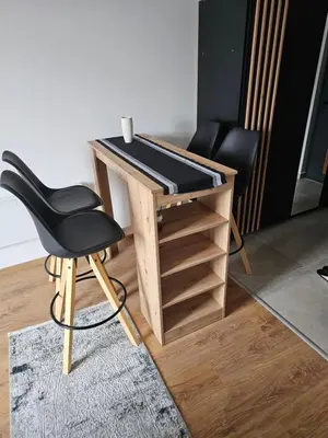 a desk with a black counter and a black chair at Kopaonik Alibi IRIS10 in Kopaonik