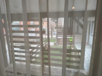 a view out of a window of a porch at Miris Proleća in Rekovac