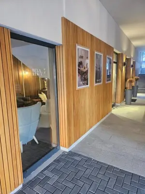 a room with a large glass window with a bath tub at Nest 316 Bela Reka Kopaonik in Brzeće