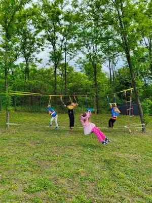 a group of children playing in a park at Vezirove zore in Paraćin