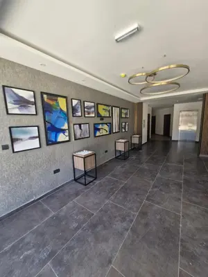 a large room with pictures on the walls at RELAX RESIDENS-kopaonik in Kopaonik
