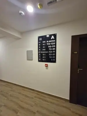 a sign on a wall in a room at RELAX RESIDENS-kopaonik in Kopaonik