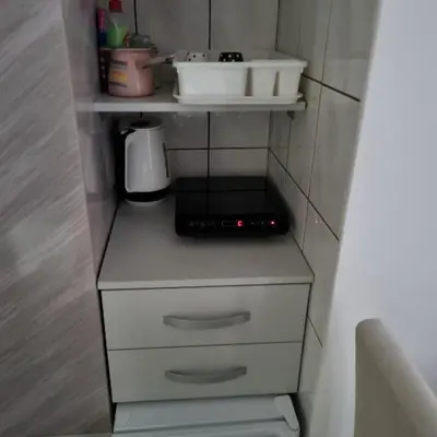 a small kitchen with a counter with a sink at Studio Sestica vila Lenka2 in Vrnjačka Banja