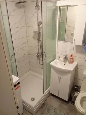 a bathroom with a shower and a sink at Banjski Raj in Vrnjačka Banja