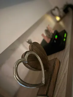 a pair of ropes sitting on top of a table at SpaNish apartman 4 in Niš
