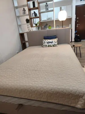 a bed in a room with a large mattress at Bili Prestige Lux in Paraćin