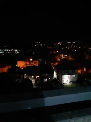 a view of a city at night with lights at Bili Prestige Lux in Paraćin