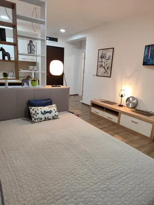 a bedroom with a large bed in a room at Bili Prestige Lux in Paraćin