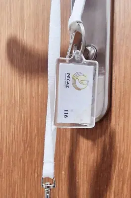 a key chain with a sign on it on a table at See U in Pegaz in Vrnjačka Banja