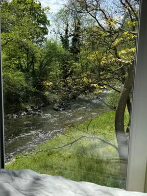 a view of a river from a window at Vikendica Borjak in Kraljevo