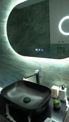 a black sink in a bathroom with a mirror at Astera 3 in Vrnjci