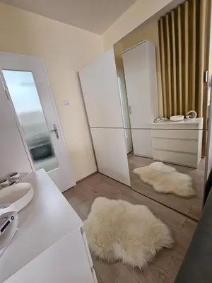 a bathroom with a sink and a mirror at Anastasija Lux 2 in Paraćin