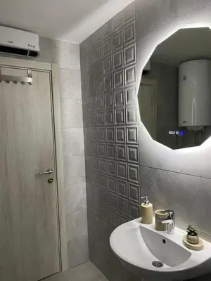 a bathroom with a sink and a mirror at Astera 4 in Vrnjci