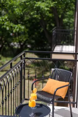 a table with a yellow toy sitting on top of it at Vila Dara in Vrnjačka Banja