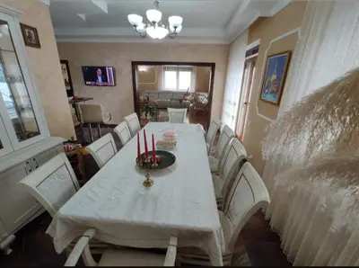 a dining room with a table with candles on it at Village House Gracac in Ðurovići