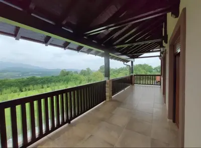 a balcony of a house with a view at Village House Gracac in Ðurovići