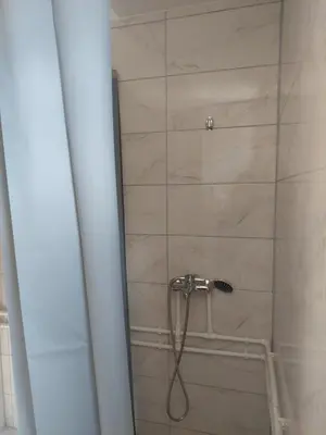 a shower with a hose in a bathroom at Drinska Ljepotica Ljubovija in Bukorovac