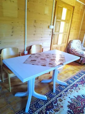 a blue table with chairs in a room at Drinska Ljepotica Ljubovija in Bukorovac